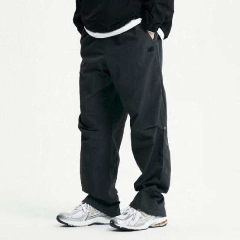 

New Balance Uni Woven Straight Pants Nbnte11013 60 charcoal/80
