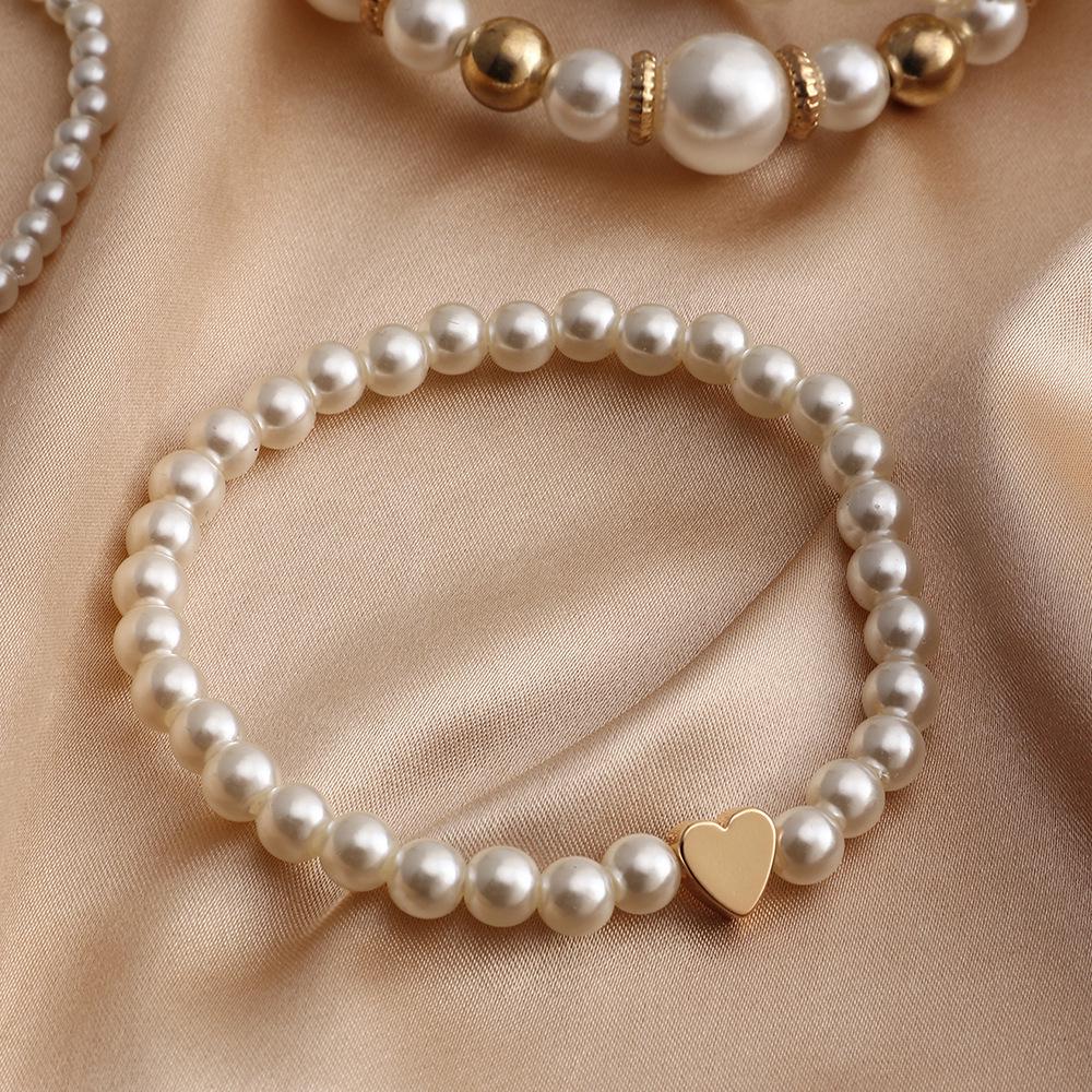 Elegant Pearl Heart Bracelet: Naju BZ1365 European & American Fashion