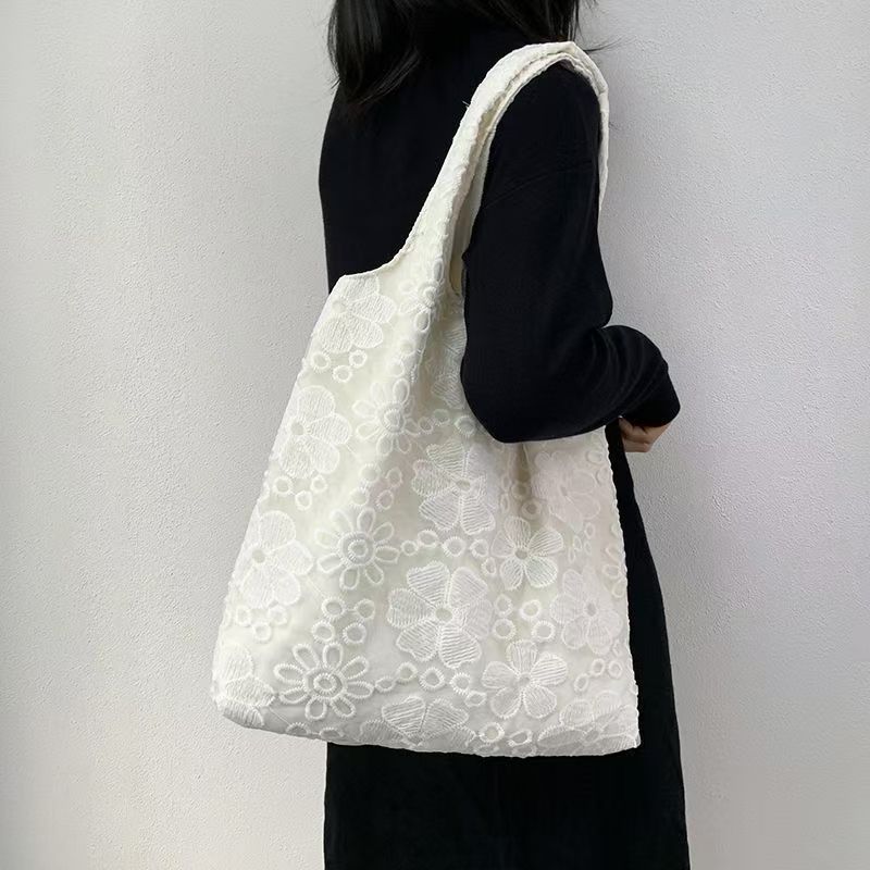 Milk white flower lace embroidered tote bag Korean fairy bag single shoulder student commuting large capacity tote bag