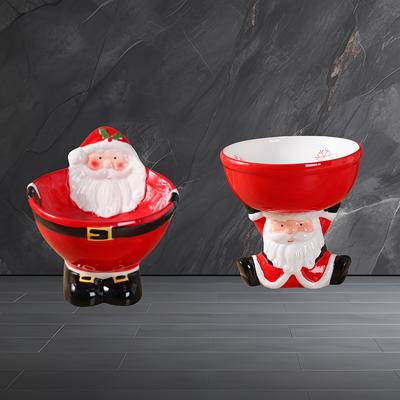 Kreative Keramikschüssel für Haustiere mit Weihnachtsmann-Design, entworfen, um Umkippen zu verhindern, mit einem hohen Fuß, der Ihrer Katze eine festliche Note verleiht.