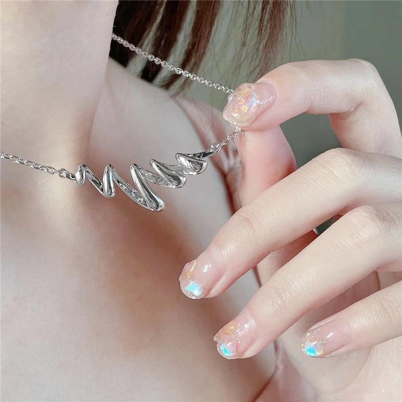 Elegant Hollow Water Wave Pendant Necklace with Spiral Spring Design - Light Luxury Clavicle Chain