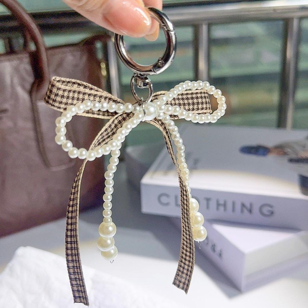Neuer Schlüsselanhänger mit Schleife aus Leopardenband, Spitze, Imitationsperle, Modedesign, Anhänger, Taschenschlüsselanhänger, Handykette, Hängezubehör