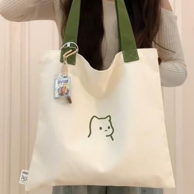 Nuova borsa in tela 2025, nuova borsa a mano in tessuto da donna, borsa per libri di grande capacità, borsa a tracolla per ripetizioni per studenti delle scuole medie