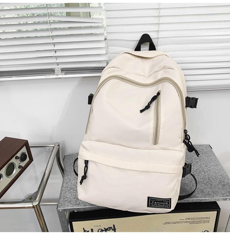 New Korean version of men's and women's large-capacity backpack, junior high school student schoolbag, casual couple college student backpack