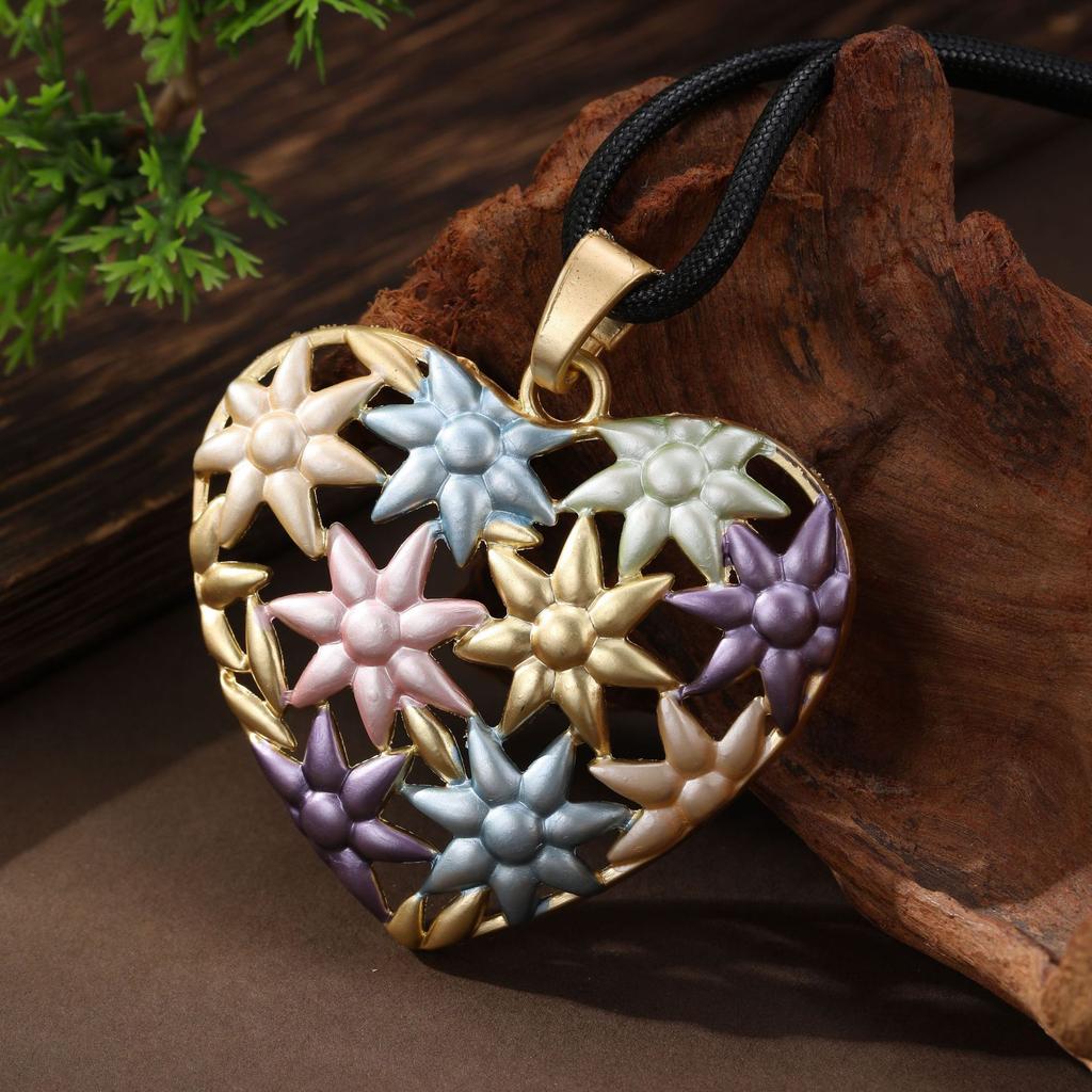 New enamel color hollow sunflower love long pendant women's high sense heart long necklace