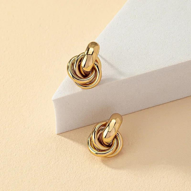 Gold Kupfer Farbe Knoten Creolen für Damen Mode Glänzende Plattierung Trendige Twist Stecker Ohrringe Stecker Niedlich Alltag Zirkon