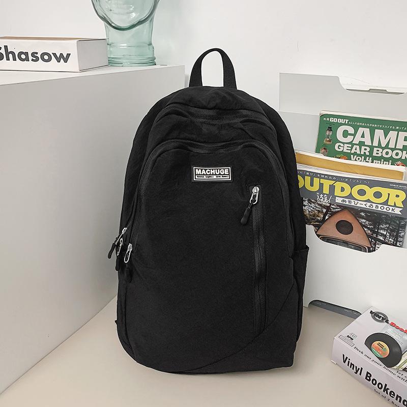 

New fashion trendy simple high sense versatile backpack women s large capacity commuter leisure sports bag чорний