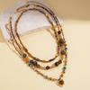 Tiger's eye stone beaded wound love clavicle sweater chain autumn and winter Maillard temperament necklace