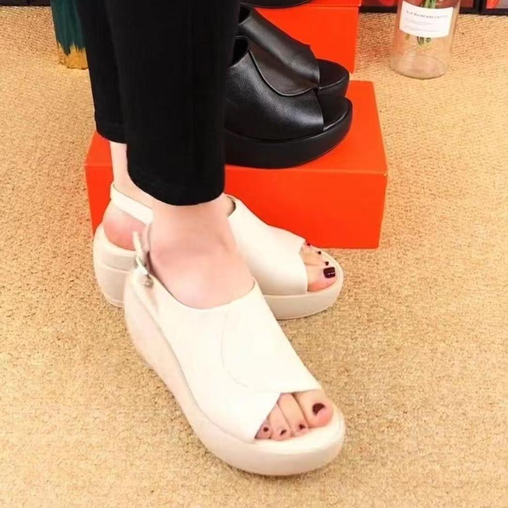 2025 summer new real soft leather slope heel cool slippers women wear fashion Internet celebrity muffin thick bottom one word cool slippers