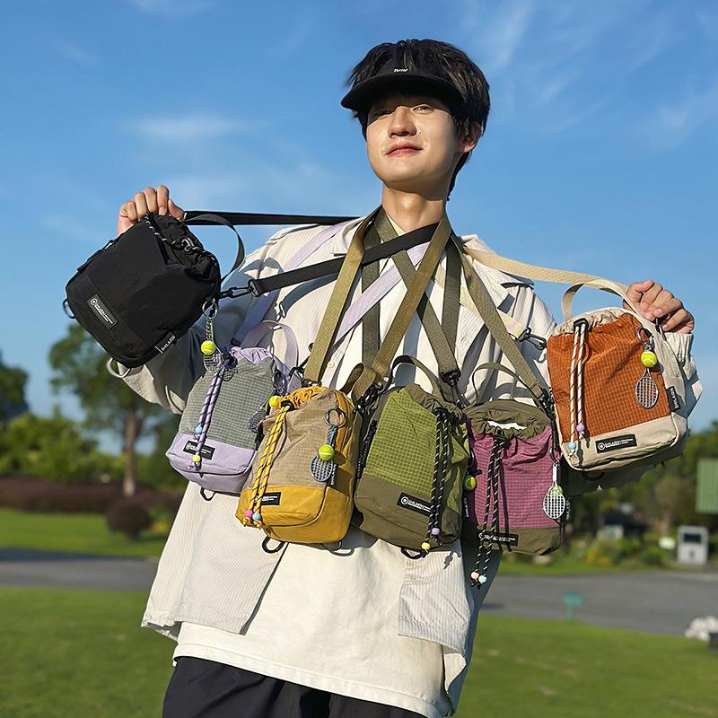 Korean-Style Unisex Outdoor Sports Mini Backpack: Versatile Water Bottle & Phone Bag