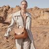 A Niche Design Camel Lychee Cowhide Spliced Hand-held Crossbody Bag