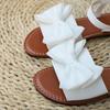 Eleganti Sandali Bianchi Lisci con Decorazione Fiocco Donna Dolci Suola Morbida Sandali con Tacco Basso Donna Scarpe con Cinturino alla Caviglia Estate 2025