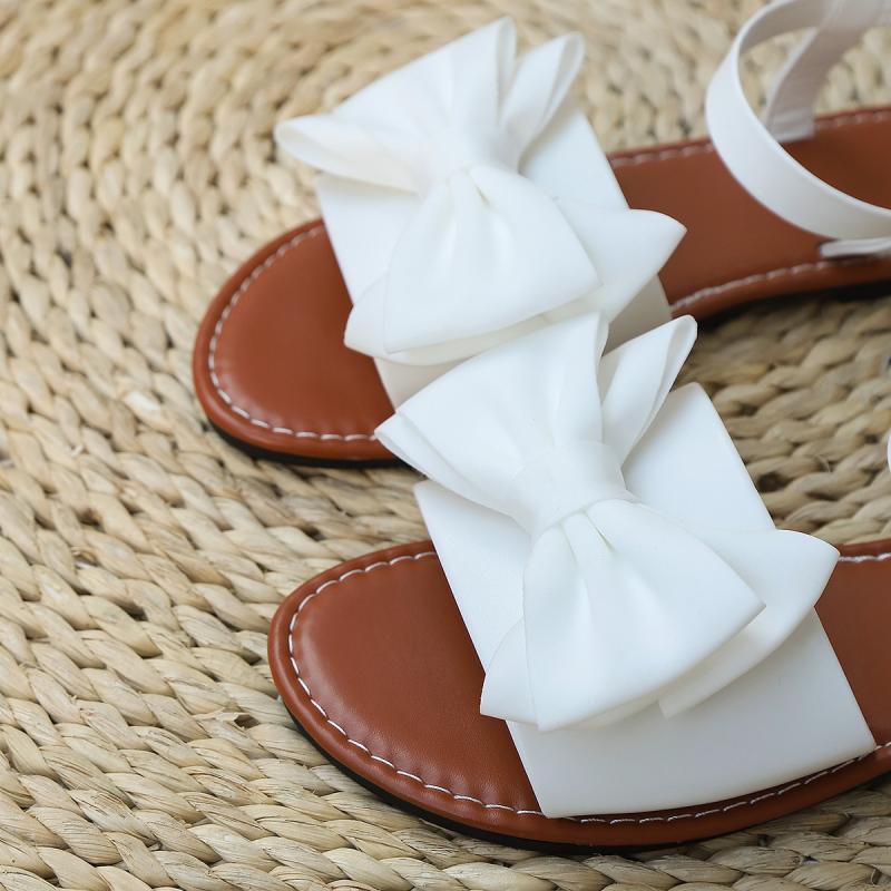 Eleganti Sandali Bianchi Lisci con Decorazione Fiocco Donna Dolci Suola Morbida Sandali con Tacco Basso Donna Scarpe con Cinturino alla Caviglia Estate 2025