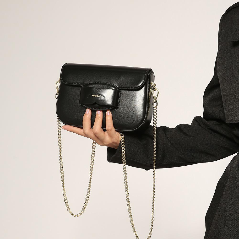 Niche design bag spring women's versatile fashion high-end exquisite messenger bag saddle tofu small square bag