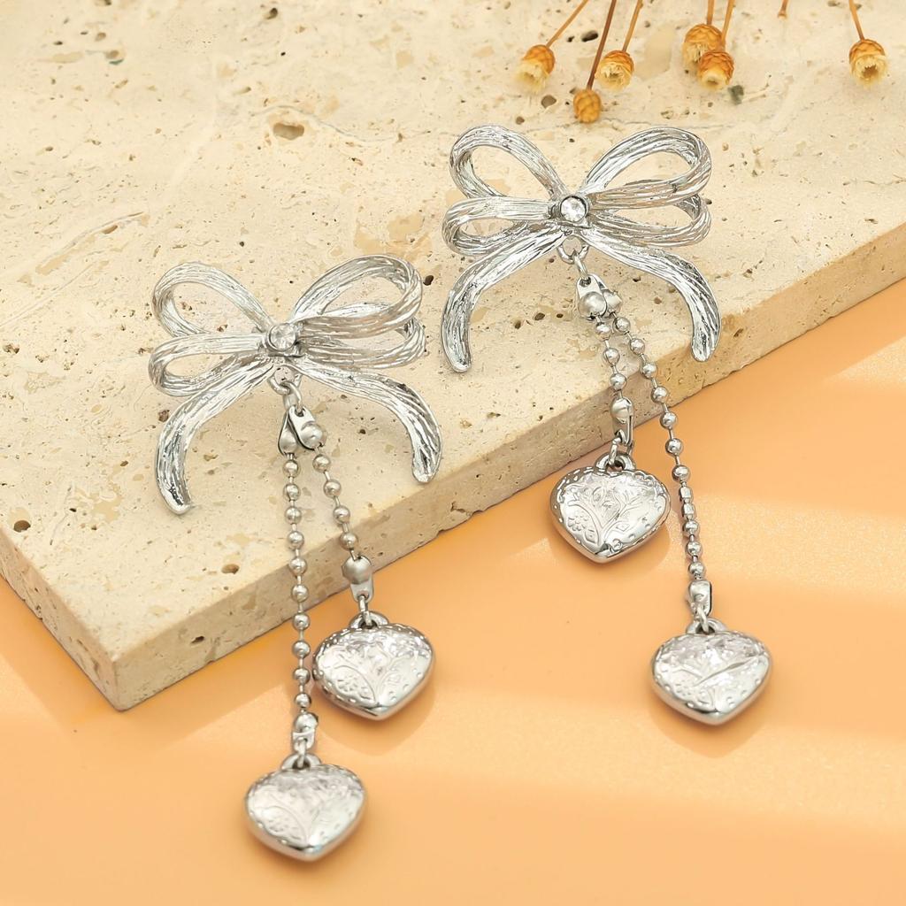 Small fresh super fairy bow fringed stud earrings female ins sweet wind niche design simple earrings