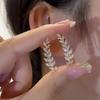 Elegant Zircon Wheat Leaf Earrings: Unique, Sparkling, and Versatile.