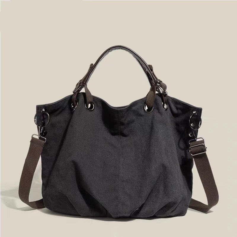 Tote Bag with Large Capacity and Multiple Pockets, for Commuting, with A Single Shoulder Strap and A Slanted Design.