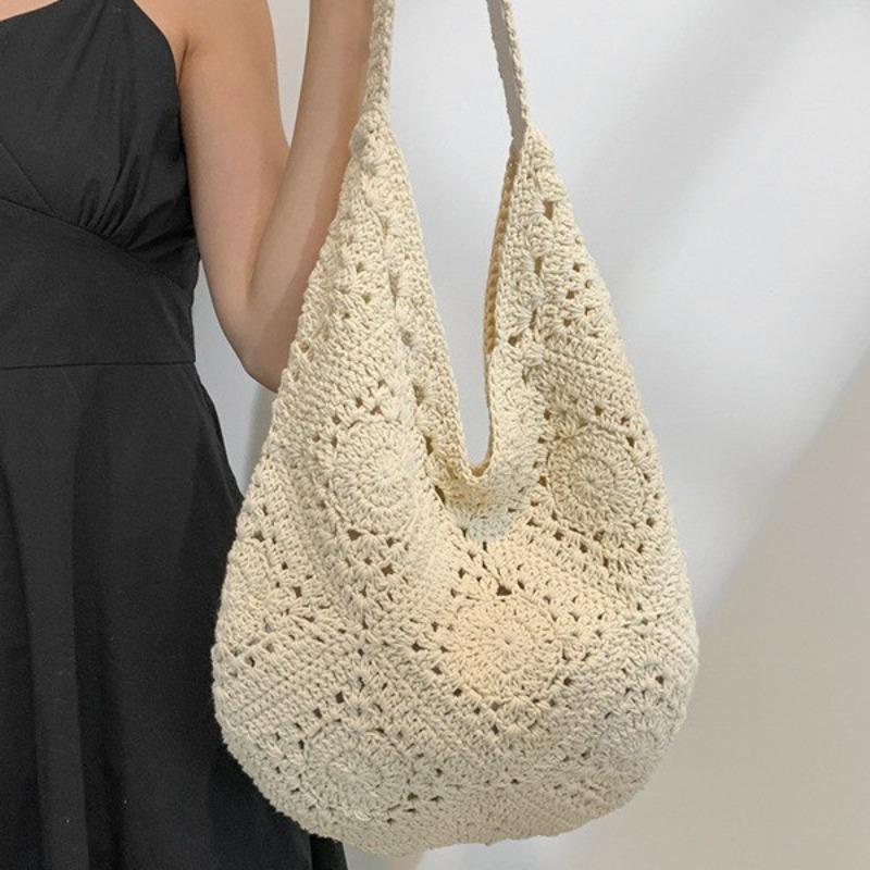 Weaving bag Hollow flower women's bag Straw bag Holiday shoulder bag Beach messenger bag Wholesale new models
