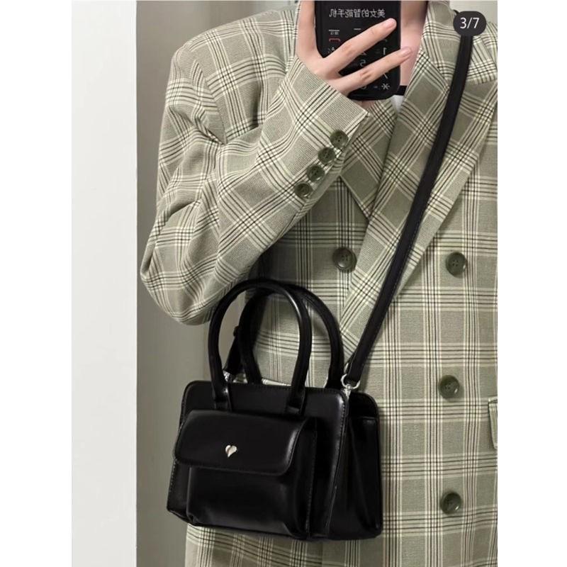 Spring niche casual fashion versatile high-end textured bag women's hand shoulder oblique span small square bag