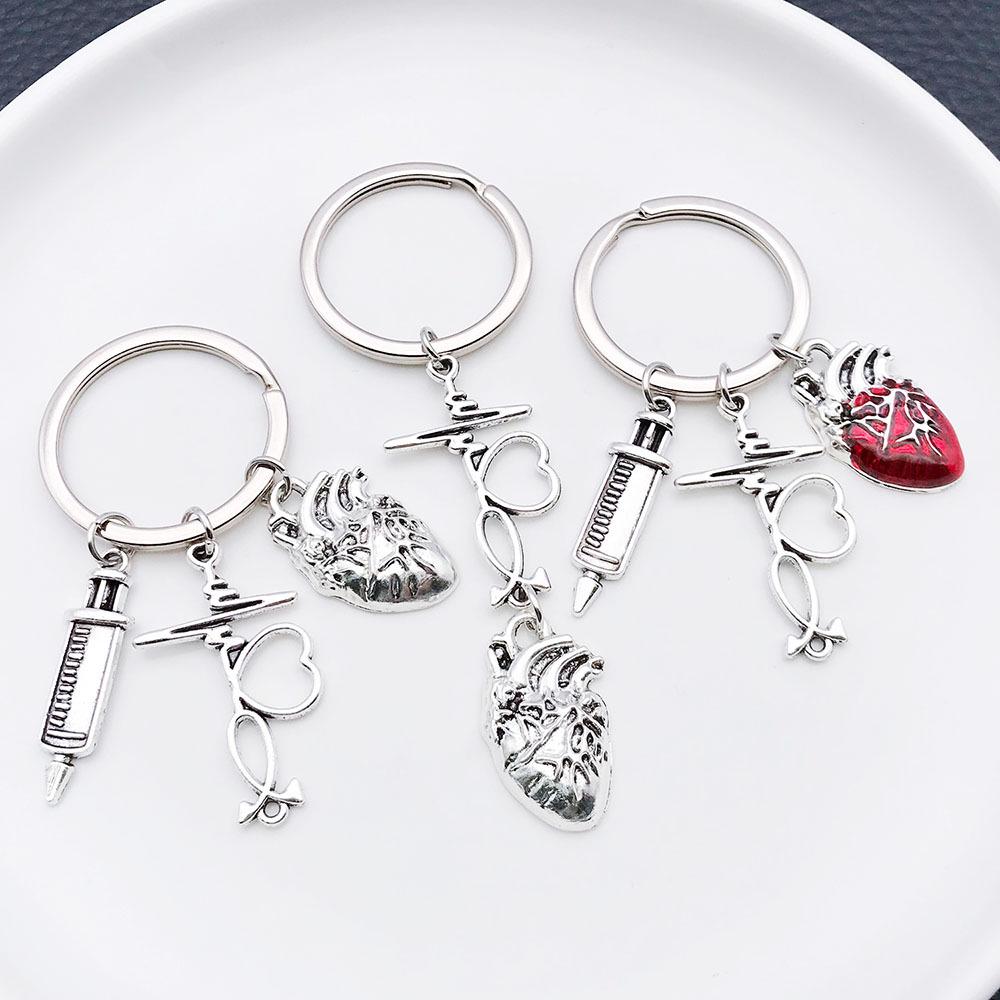 Antique Silver Medical Series Keychain: Syringe, Stethoscope, Heart, Ambulance, and ECG Zinc Alloy Pendant