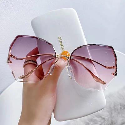 Occhiali da sole Kottdo Frameless Cut Edge per uomo e donna, moda outdoor, metallo nero sfumato