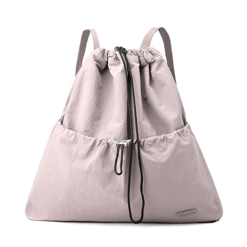 Niche daily leisure lightweight sports drawstring backpack commuter student schoolbag