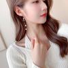 Face thin earrings trendy niche high-end long modified face fan-shaped small skirt pearl fringed earrings
