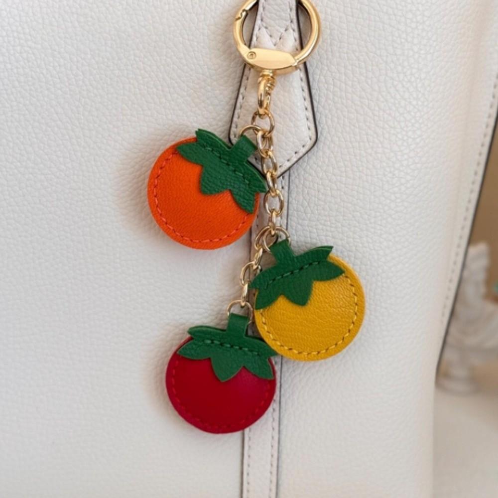 Kreativer Tomaten-Anhänger PU-Leder Oranger Schlüsselanhänger Modischer Obst-Schlüsselanhänger Rucksack-Dekoration