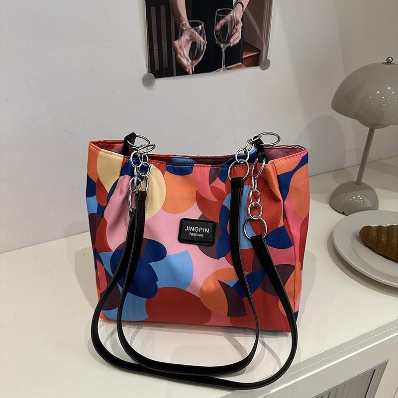Personality trend Spring and summer new fashion contrasting colors women's large capacity shoulder underarm portable tote bag