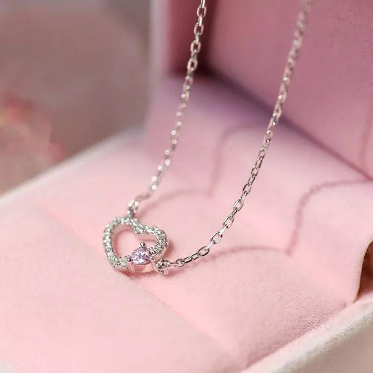 Beixi S925 Sterling Silver Heart Necklace - Cute Hollow Peach Pendant, Simple and Versatile Design.