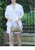 Women's Summer Linen Suit: White Shirt & Shorts Two-Piece Set - Simple, Casual, and Elegant Sun Protection.