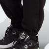 adidas Pantaloni de jogging Originals Trefoil cu logo monocrom, cu talie elastică, pentru femei, negru IA6437