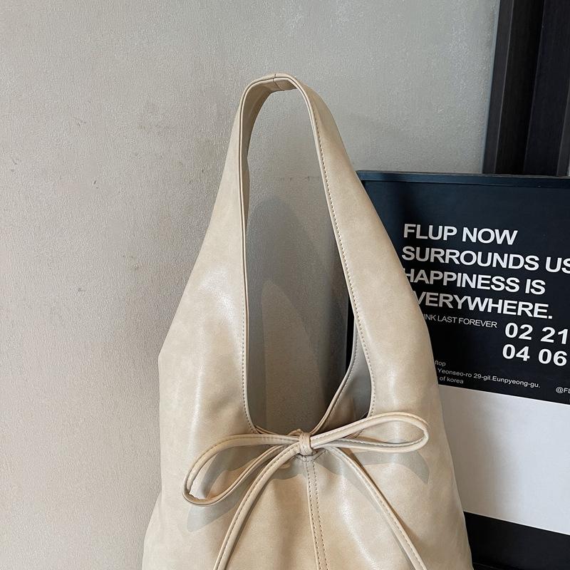 Koreanische, stylische Handtasche mit großem Fassungsvermögen und Schleifenverschluss – trendiges Design für Damen