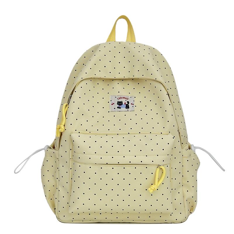 School bag: new elementary school backpack, girls' middle school students, high aesthetic value, INS style, niche, cute polka dot lightweight backpack