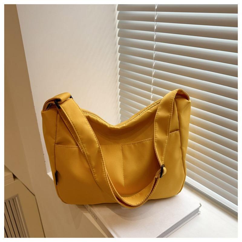 New casual messenger canvas bag, simple large-capacity shoulder bag, niche design sense, daily commuter bag