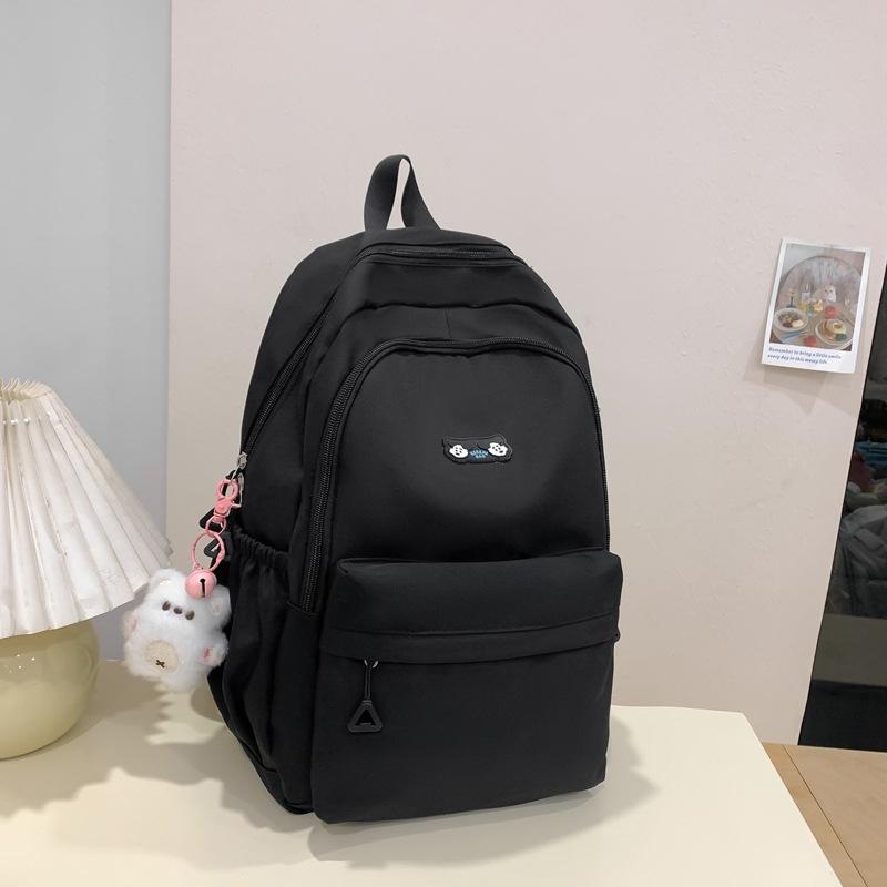 

School bag female cute large capacity junior high school campus backpack simple solid color girls backpack high value leisure bag чорний
