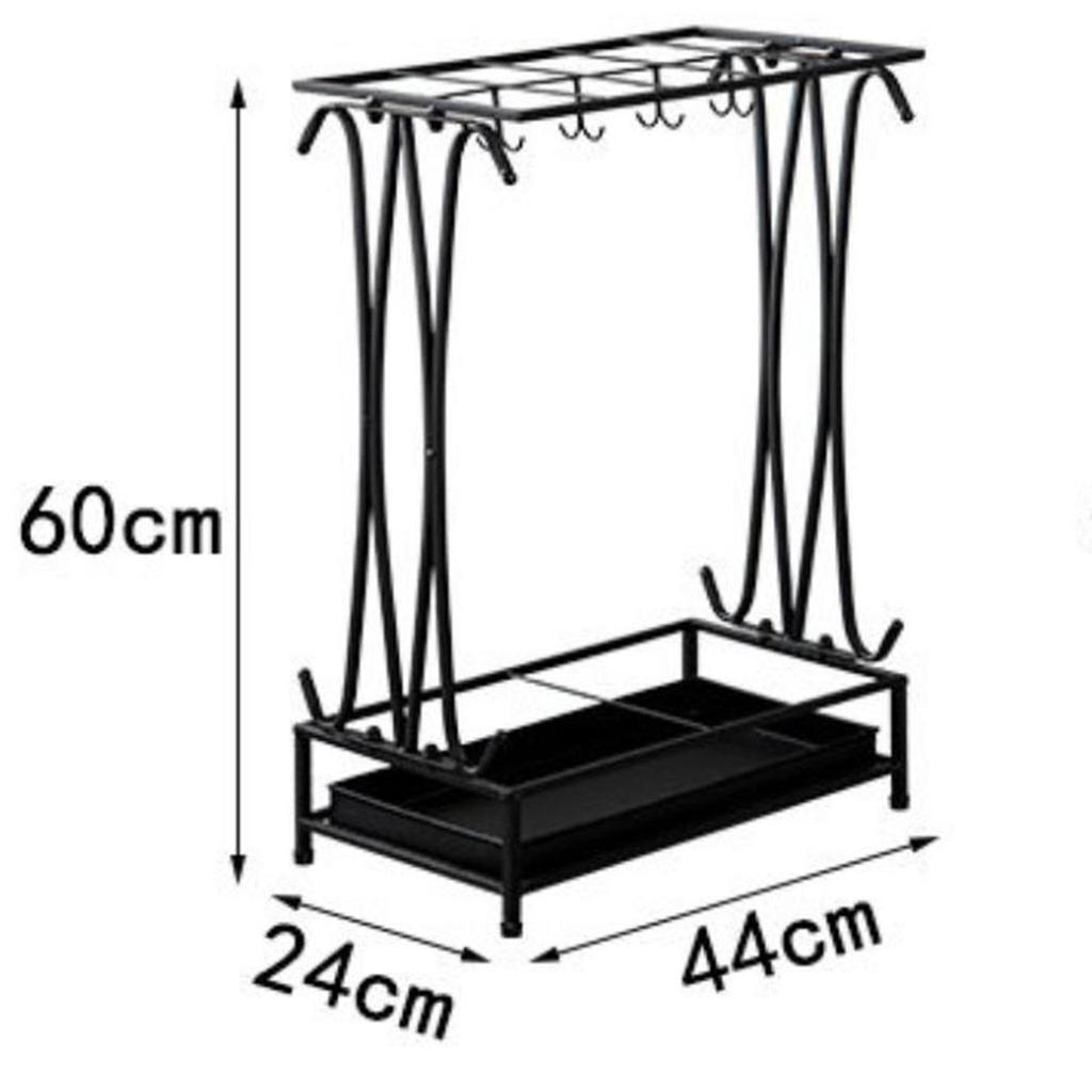 Compact Umbrella Stand with Drip Tray, Multifunctional And Metal Storage for Hotel Entrance.