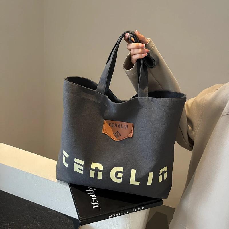 Women's shoulder bag printed letter large capacity monochromatic stitching line casual bag