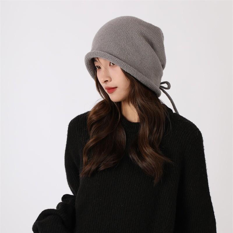 Autumn and winter Internet celebrities stacked bag head hat women's high sense metal small standard loose warm ear protection knitted hat