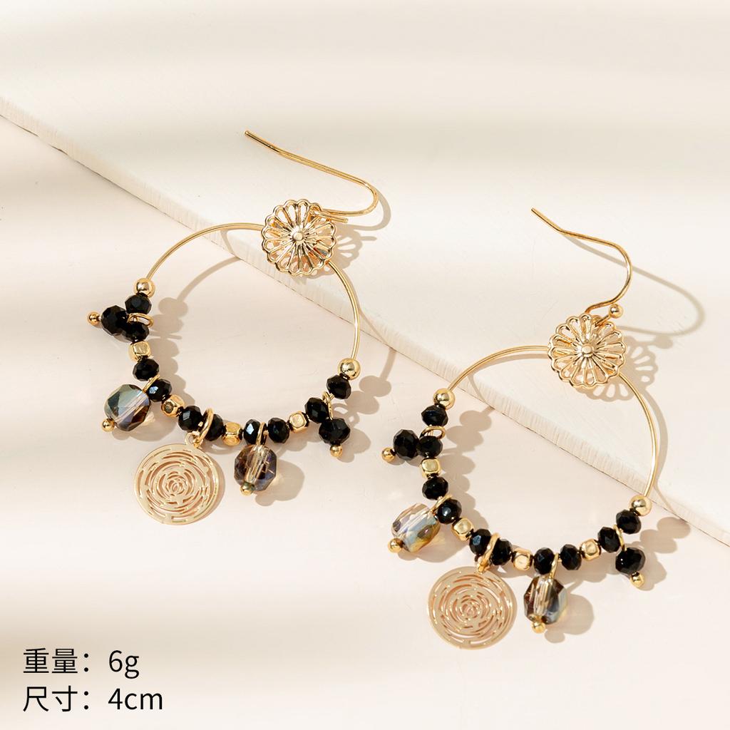 Exotic hollow fringed pendant earrings European and American women's vacation style earrings fashion earrings
