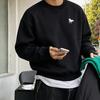 A minimalist-style crew-neck long-sleeve top with a loose fit and dropped shoulders—a casual sweatshirt perfect for fall and winter.