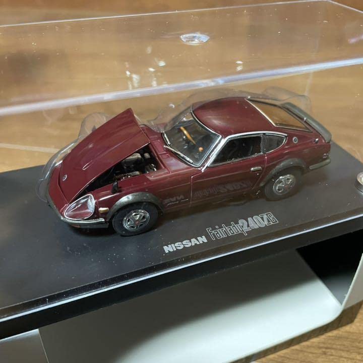 

Невыставленный Kyosho Nissan Fairlady 240ZG Бордовый 1/43