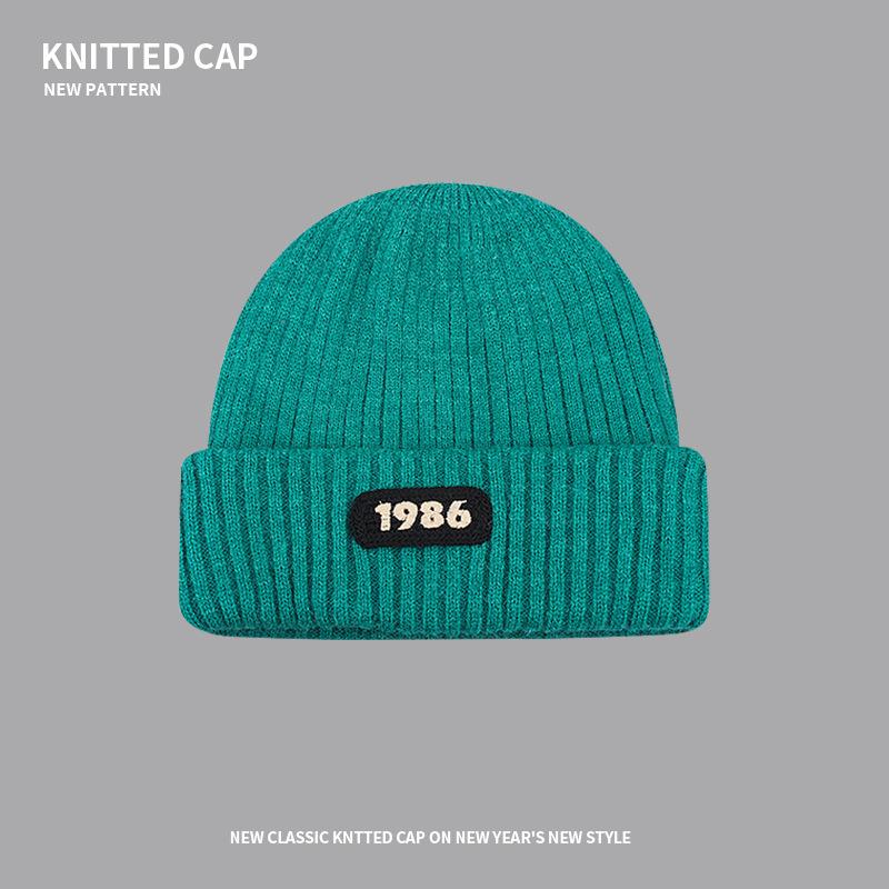 Knitted wool hat children's autumn and winter trendy brand bag head warm cold hat sticker letter big head circumference stacking hat