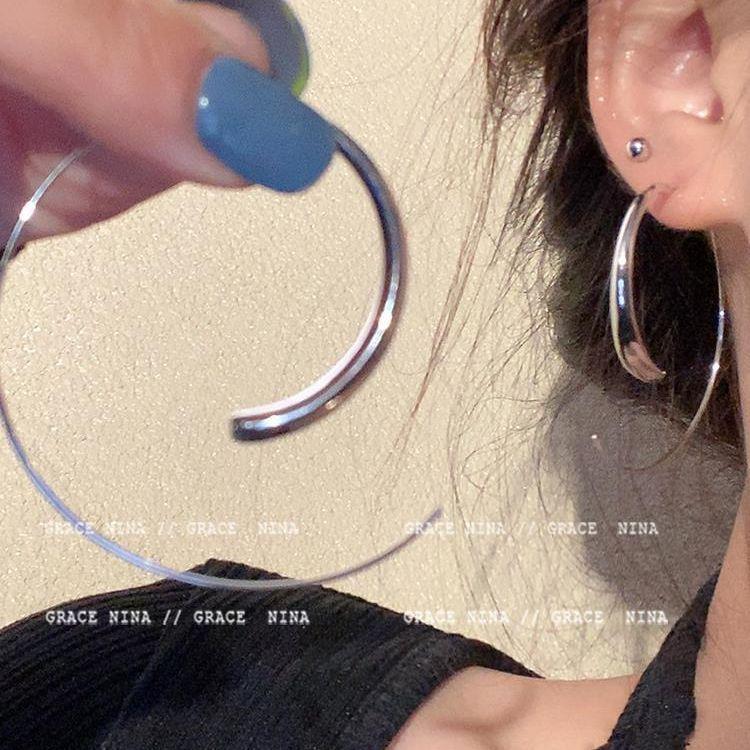 

Metal cold wind silver plain ring earrings women s niche design high-end stud earrings exaggerated personality temperament ear jewelry