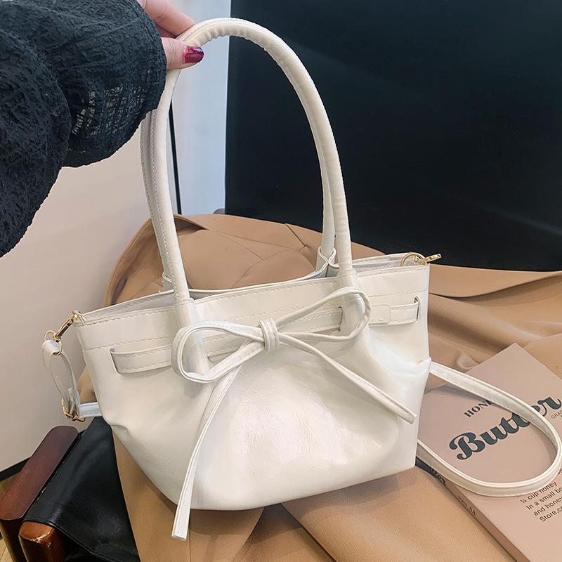 Modische, vielseitige Handtasche für Damen im Frühling und Sommer. Einfache Umhängetasche. Modische, vielseitige Umhängetasche.