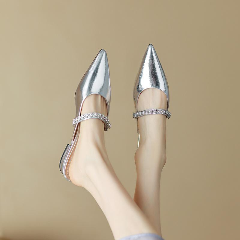 Pointed low-heeled Muller baotou half-drag women's summer 2025 new soft leather one-word with rhinestones silver flat-bottomed cool slippers