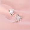 White Moonlight Love Cat Eye Stone Earrings for Women with Niche Design High-end Cold Style Earrings