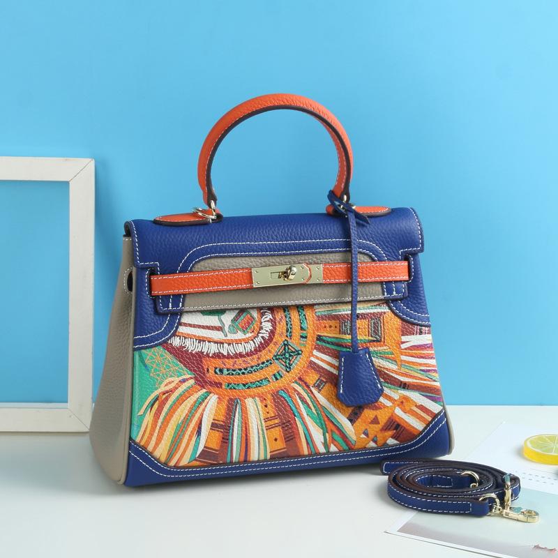 Neue Mode Vielseitige Bedruckte Graffiti Kelly Tasche Echtes Leder Cartoon Kontrastfarbe Erste Schicht Rindsleder Ein Schulter Crossbody Handtasche