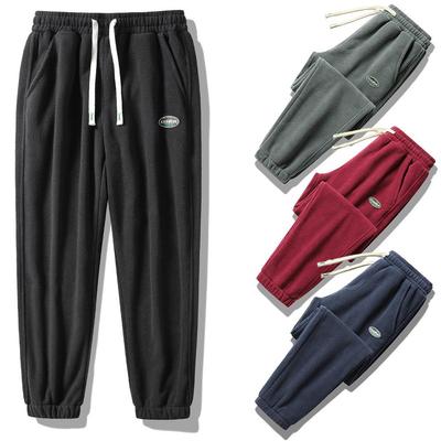 Calça de moletom de lã polar plus veludo grossa calças casuais soltas calças esportivas masculinas tamanho grande