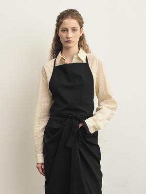 And Tomorrow, a Layered Apron Wool Bustier In Black Stripes.